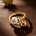 Ring double headed round open ring.